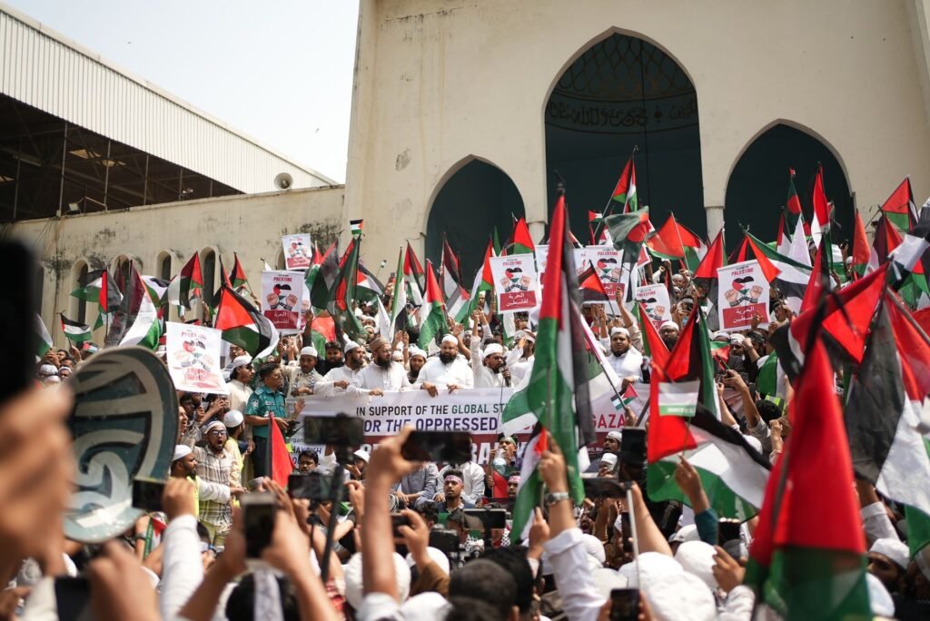 Protesters holding flags and banners.