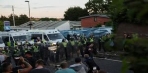 Police confront crowd during protests