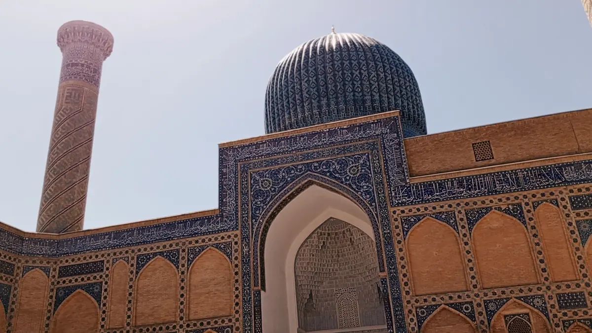 Gur-e-Amir mausoleum of Amir Timur in Samarkand with its ribbed turquoise dome and tiled portal